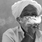 277 Nancy PanicucciRoma_All Things Considered ADVANCED MONOCHROME_Village Man in India Smoking Clay Pipe_Award